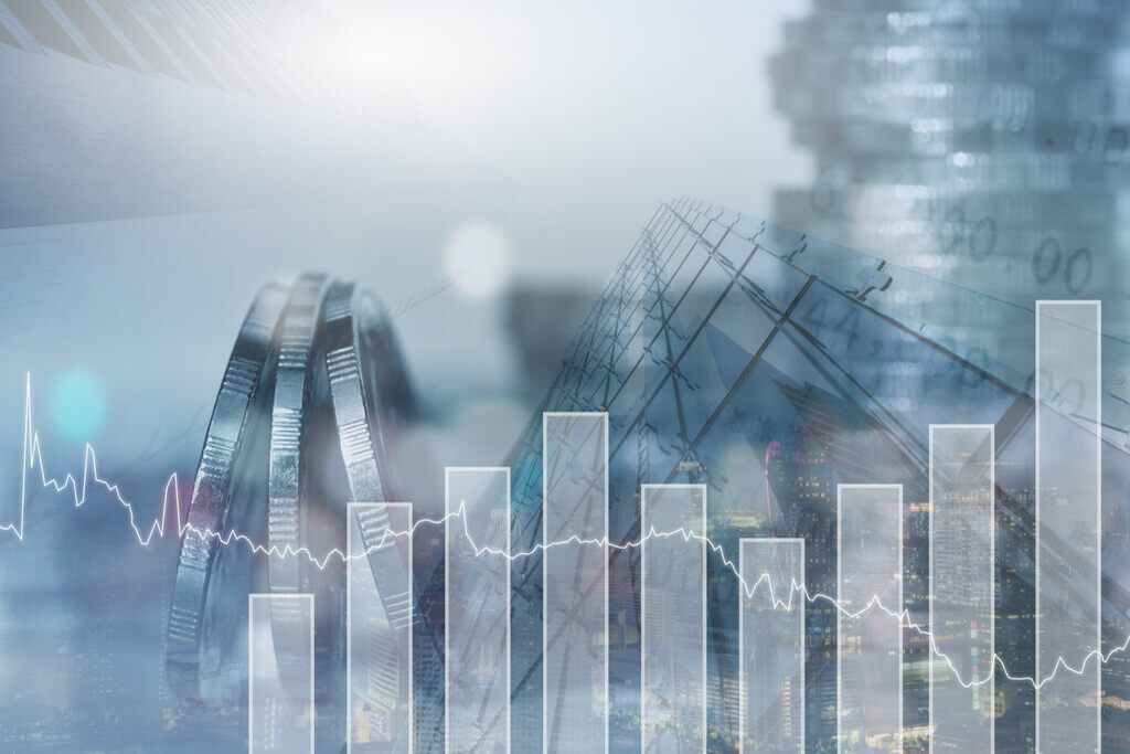 Moedas e gráficos representando os ciclos econômicos