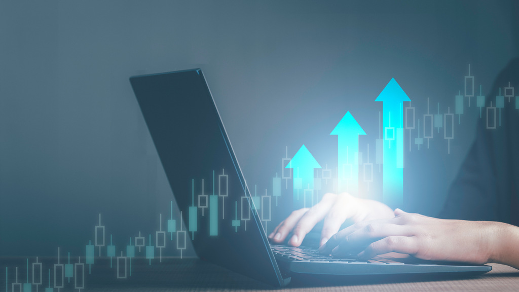 notebook e setas ilustrativas representando a letra de câmbio