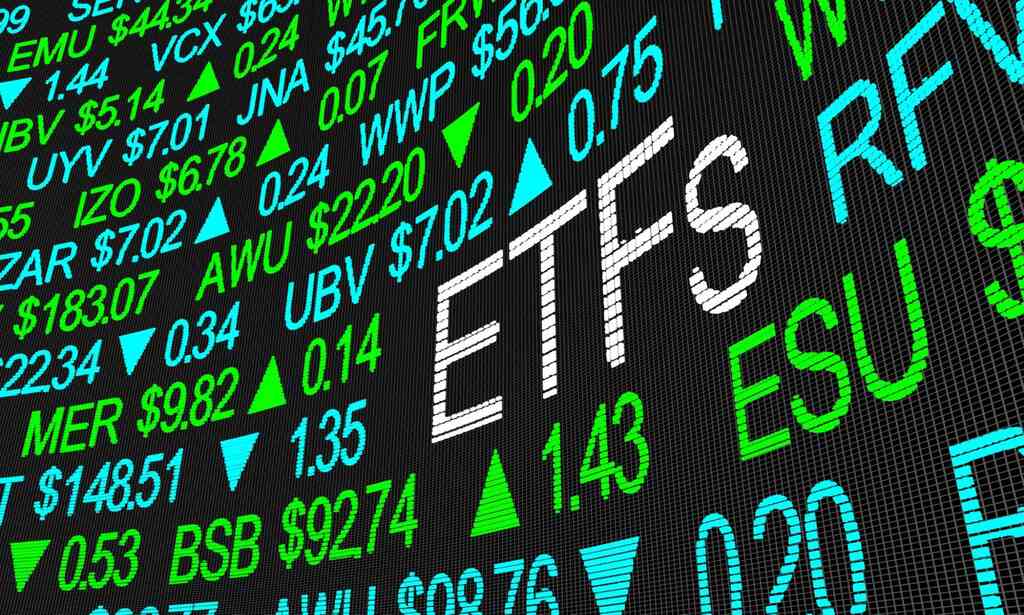 Painel de mercado financeiro representando os ETFs que pagam dividendos