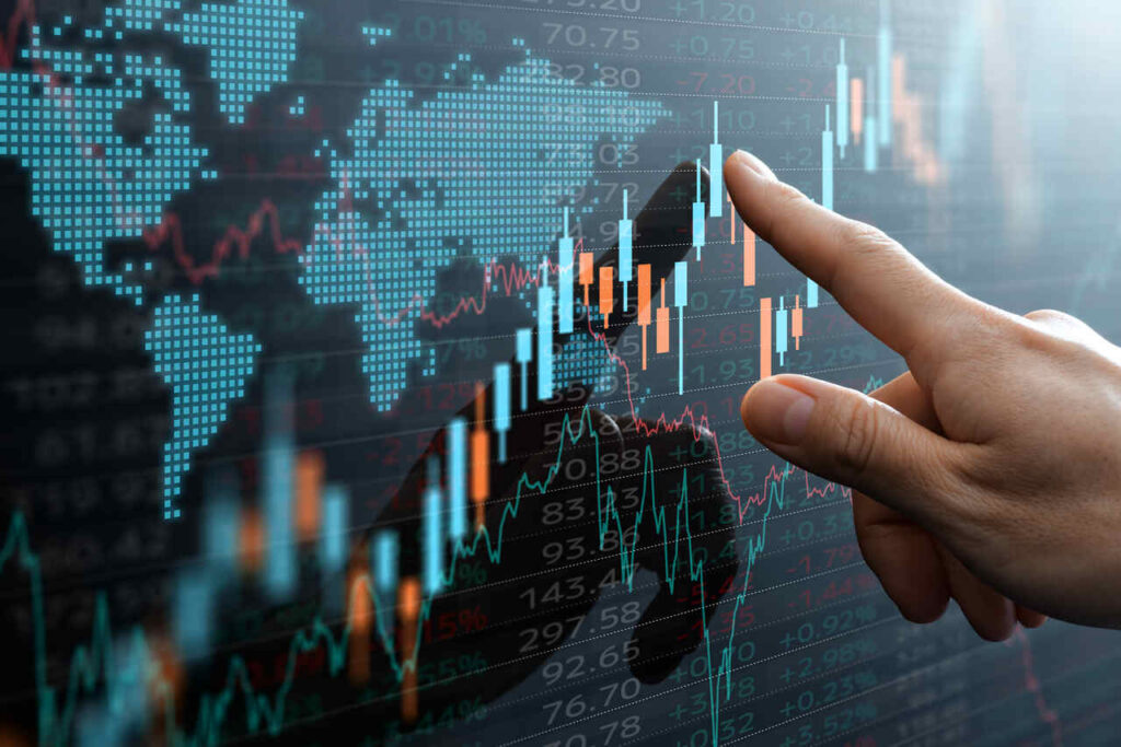 Gráfico do mercado financeiro com mapa global e oscilações representando a volatilidade dos investimentos.
